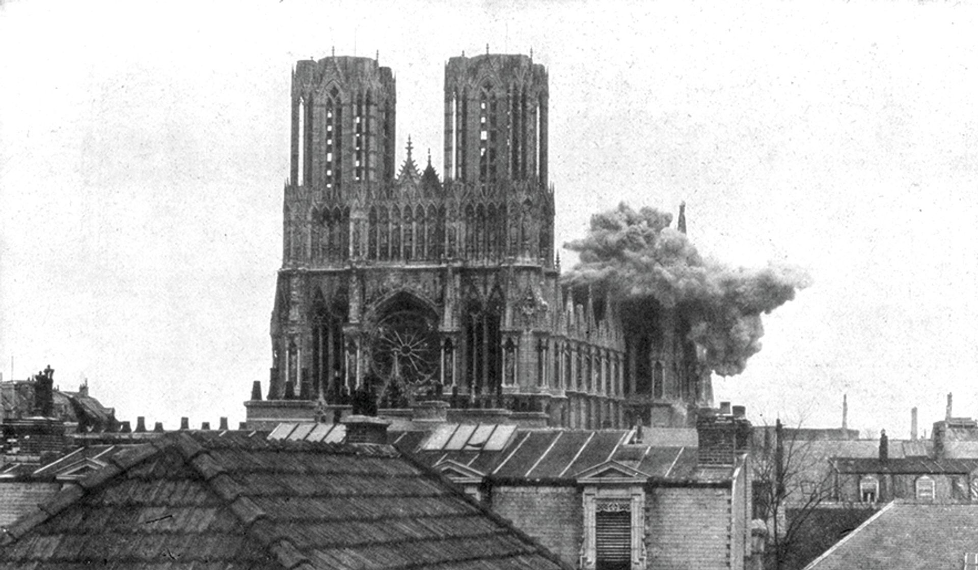 A shell exploding on the choir of Rheims Cathedral, April 1917 © The Print Collector