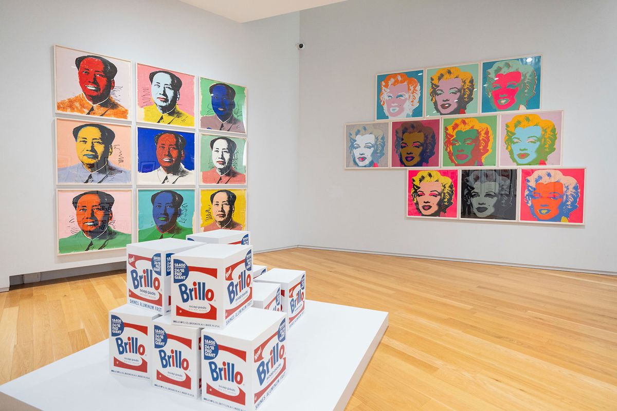 An installation shot of Andy Warhol Three Times Out at the Hugh Lane Gallery, Dublin, featuring screenprints from a 1972 Mao edition and a 1967 Marilyn (Marilyn Monroe) edition and Brillo Boxes (1968) in wood, paint and silkscreen ink © 2023 The Andy Warhol Foundation for the Visual Arts, Inc. / Licensed by Artists Rights Society (ARS), New York / IVARO, Dublin, 2023. Photograph: Naoise Culhane