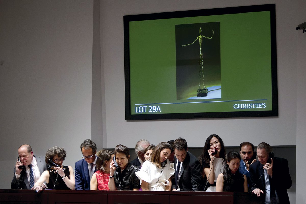 Many women work at auction houses, but few are in the most highly paid jobs REUTERS/Carlo Allegri