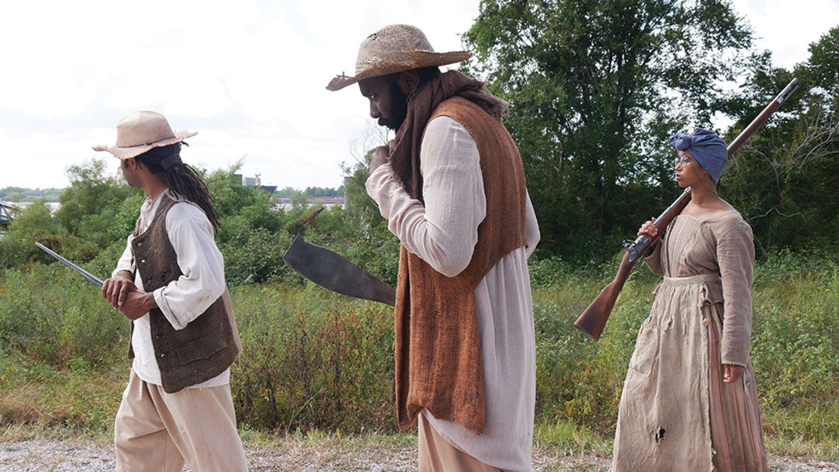 A rehearsal in period dress for the Slave Rebellion Re-enactment courtesy of the artist