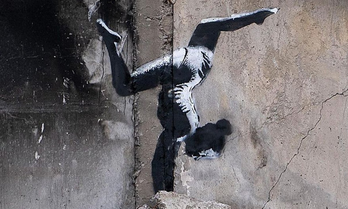 Banksy creates mural on bombed constructing in Ukraine Banksy creates mural on bombed constructing in Ukraine