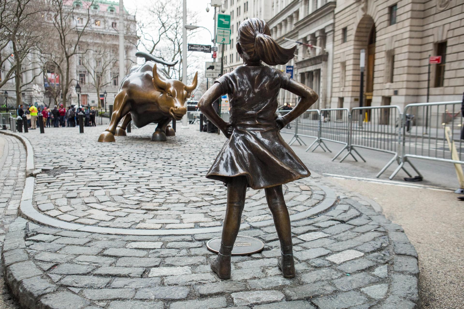 The Fearless Girl statue by Kristen Visbal faces the Charging Bull Anthony Quintano via Flickr