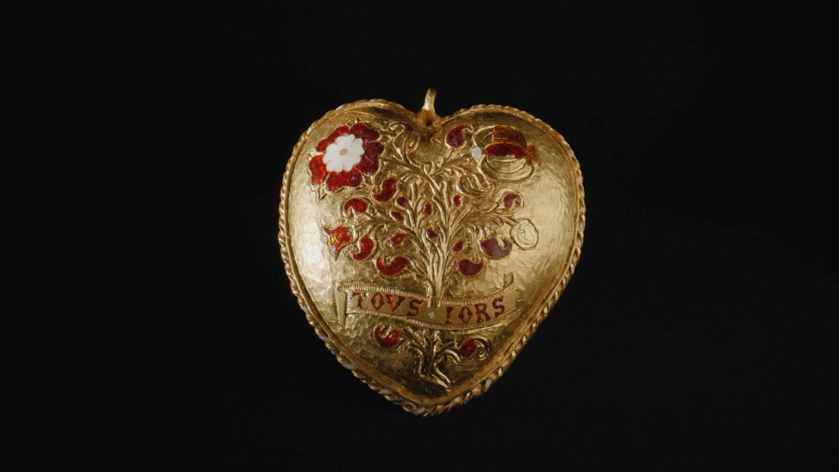 One side of the pendant features the emblems of a Tudor rose and a pomegranate tree merged together © The Trustees of the British Museum