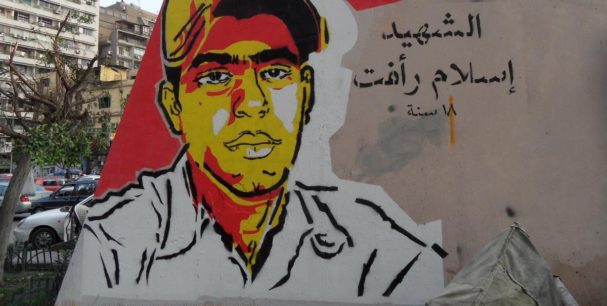 Ganzeer's memorial portrait for 18-year-old Islam Rafat Zinhoum who killed by a security truck on 28 January 2011. It was painted in March 2011 close to Tahrir Square. Photo: Alisdare Hickson Ganzeer's memorial portrait for 18-year-old Islam Rafat Zinhoum who killed by a security truck on 28 January 2011. It was painted in March 2011 close to Tahrir Square. Photo: Alisdare Hickson