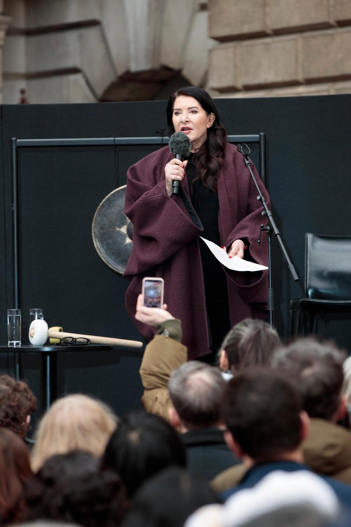 Marina Abramović performs An Invitation to Love Unconditionally in the Annenberg Courtyard at the Royal Academy of Arts, London. Her exhibition Marina Abramović is open until 1 January 2024. 

Photo: © John Phillips / Getty Images for the Royal Academy of Arts.