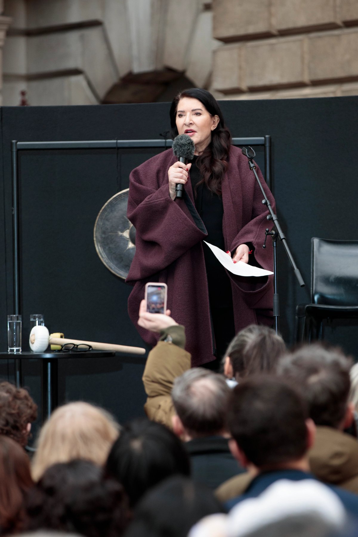 Marina Abramović performs An Invitation to Love Unconditionally in the Annenberg Courtyard at the Royal Academy of Arts, London. Her exhibition Marina Abramović is open until 1 January 2024. 
Photo: © John Phillips / Getty Images for the Royal Academy of Arts.