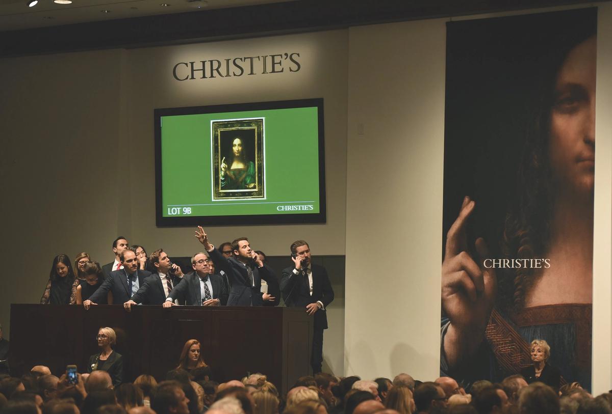 Salvator Mundi auction at Christie's New York
TIMOTHY A. CLARY/AFP VIA GETTY IMAGES.
