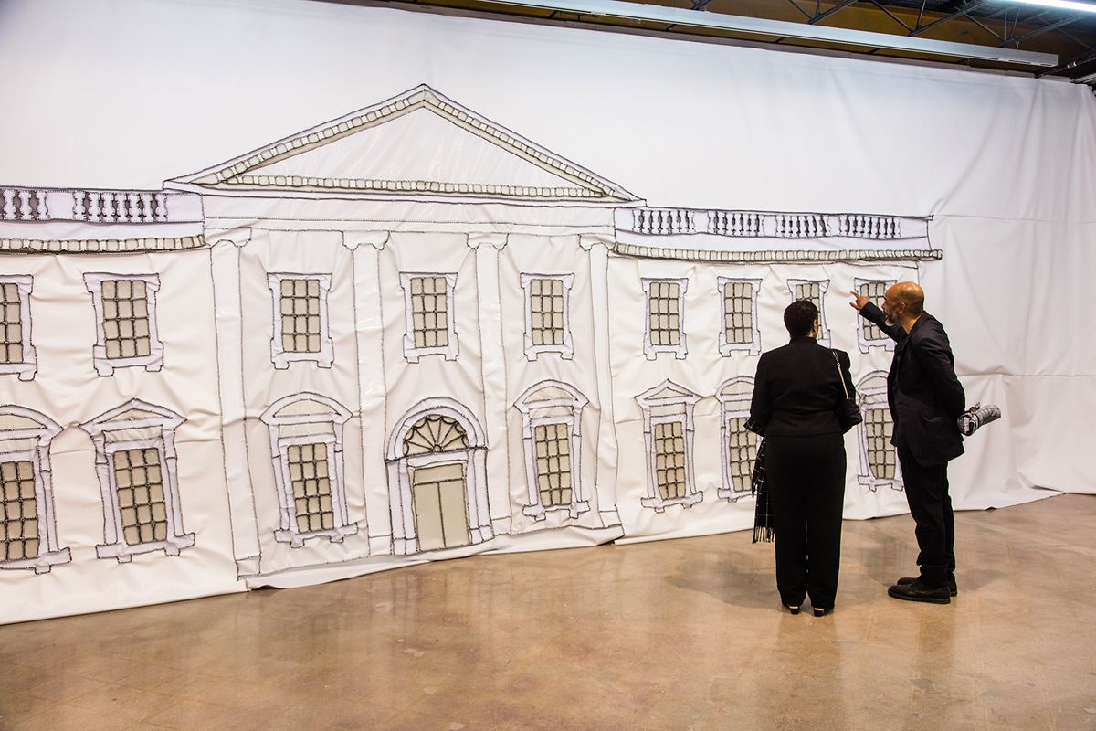 Rodney McMillian, right, with his mother Eunice Graham in front of White House Painting (2018) Photo: Brian Fitzsimmons