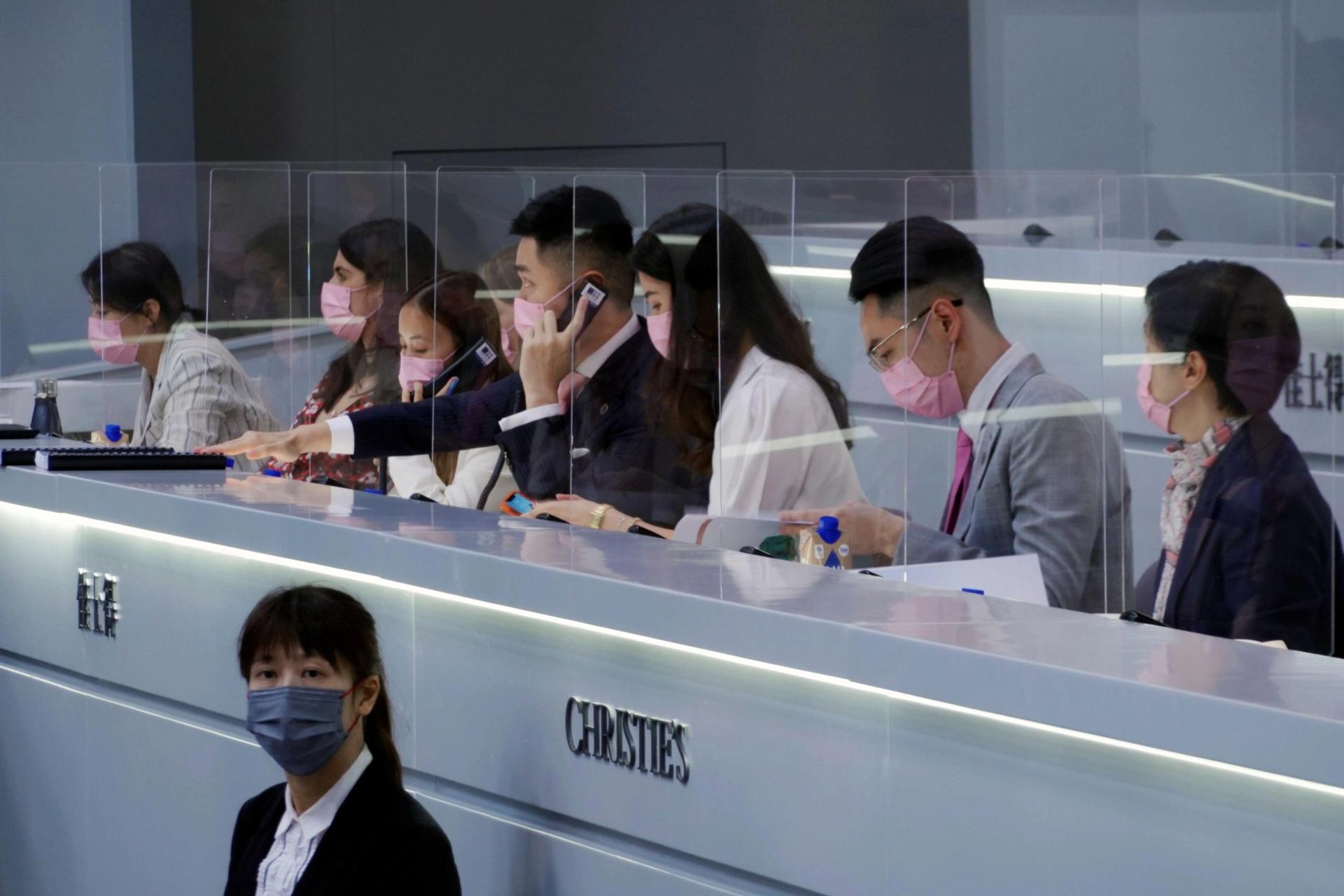Christie's phone bidders in Hong Kong, an increasingly important market © Reuters/Alamy Stock Photo