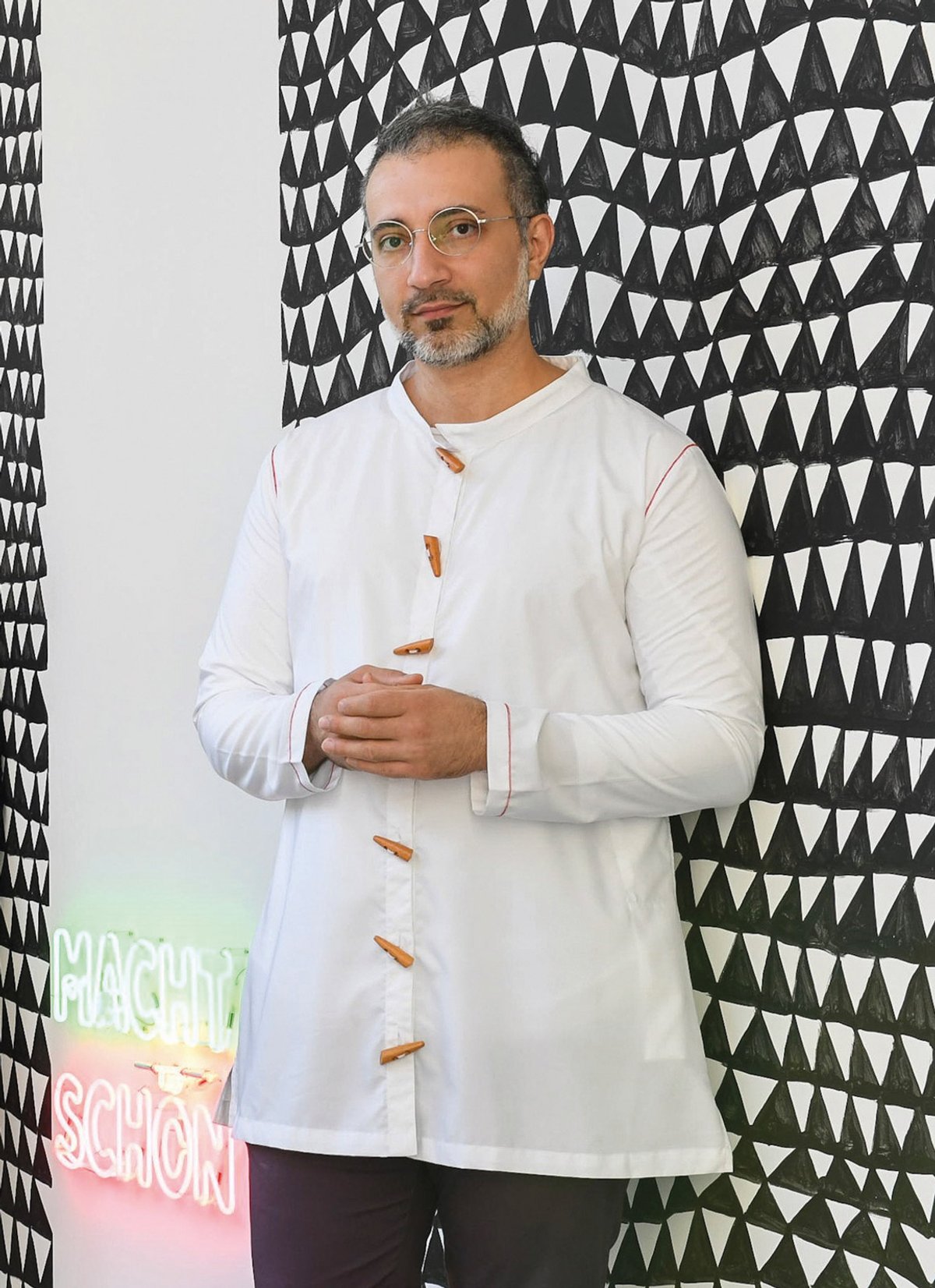 The artist Rokni Haerizadeh says the Tehran Museum of Contemporary Art  bought his painting after it was shown in Tehran in 2003. © Miquel Coll