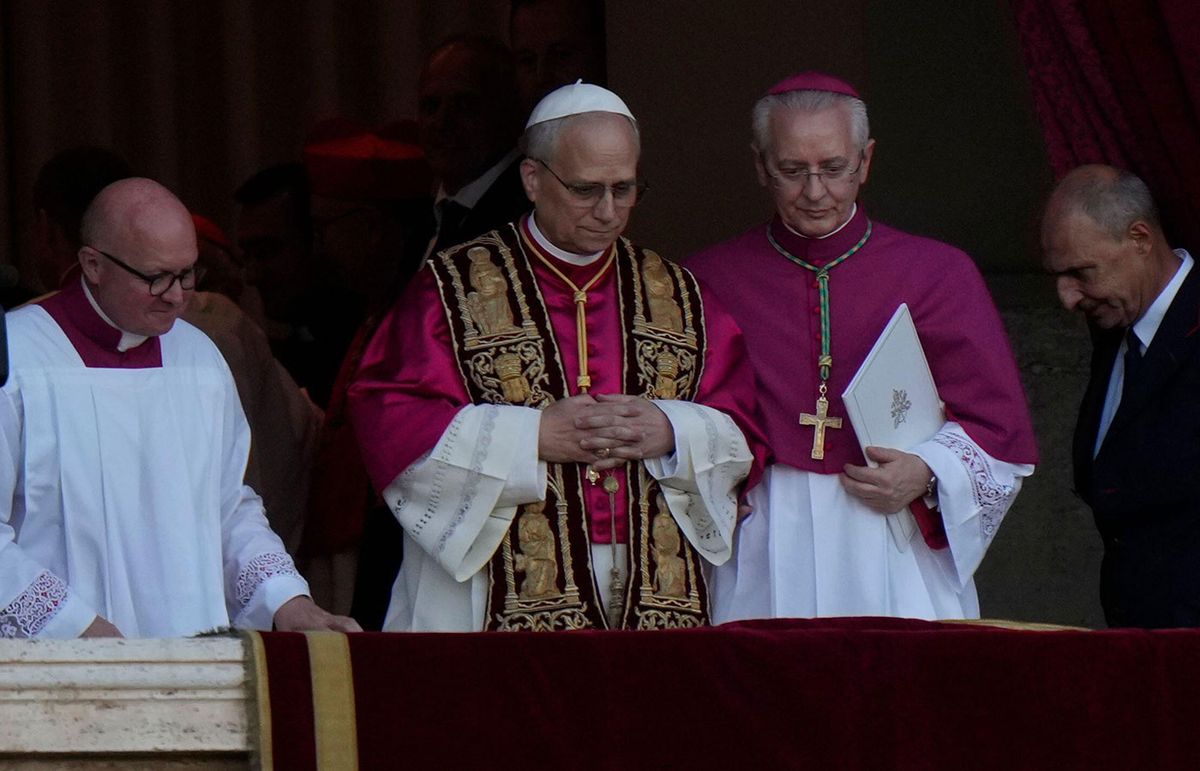 Pope Leo XIV appears on the balcony of St Peter's Basilica after his election at the Vatican on 8 May AP Photo/Luca Bruno/Associated Press / Alamy Stock Photo
