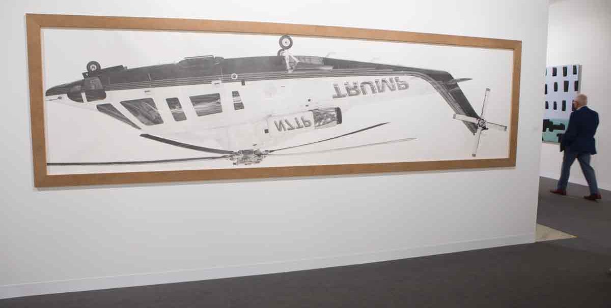 Donald Trump’s helicopter has been turned upside down in Karl Haendel’s Inverted Mirrored Trump Chopper (2018), a large pencil drawing priced at $40,000. The Los Angeles-based gallery is also showing a second work featuring Trump, this time by Nicole Eisenman. The US artist has reworked The Tea Party (2012-17), which originally featured a “generic rich fat man” next to a figure of death, “with a Trump face”, says the gallery’s director, Susanne Vielmetter. The work is priced at $60,000. Karl Haendel, Inverted Mirrored Trump Chopper (2018) Susanne Vielmetter Los Angeles Projects © David Owens