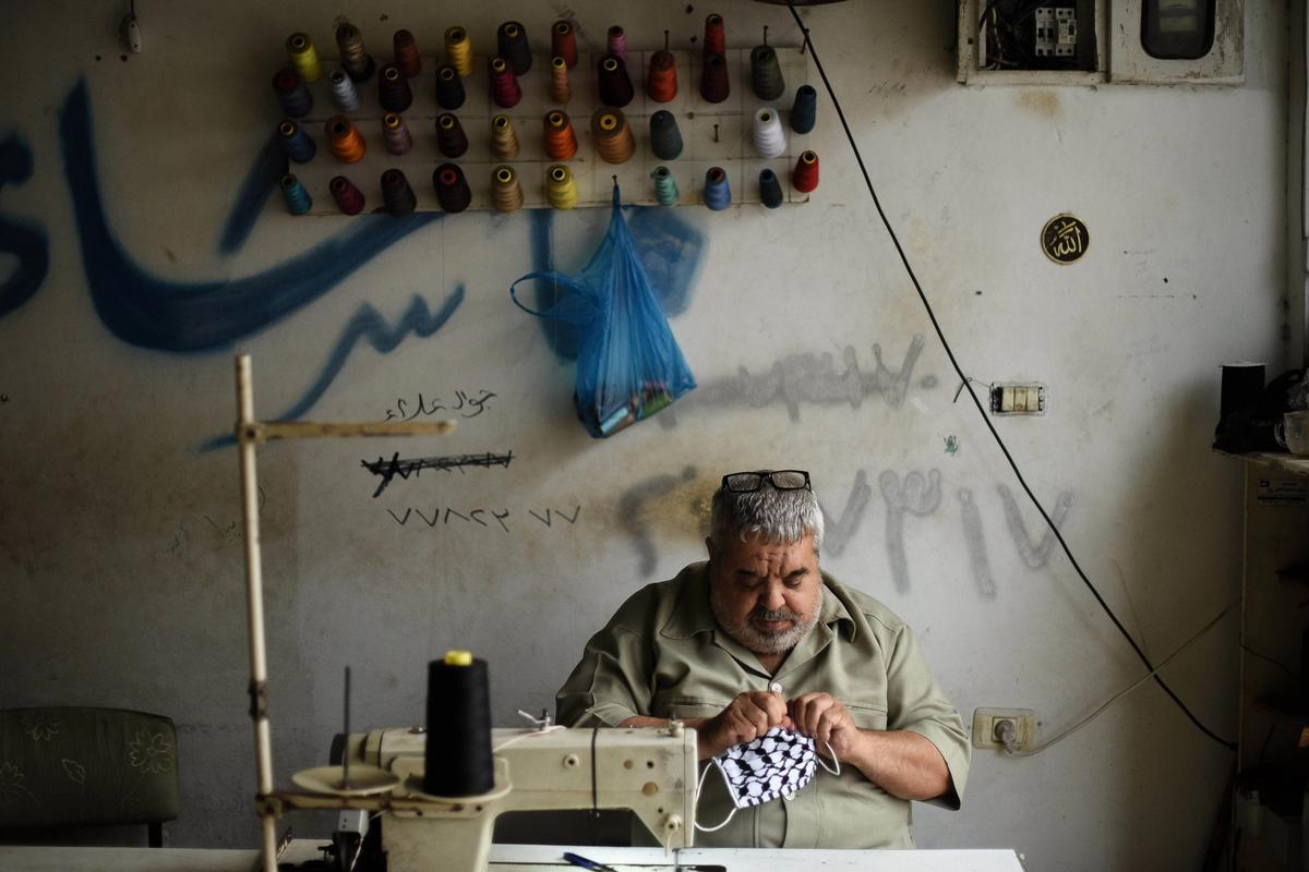 The face masks are being crafted and distributed from a workshop in Gaza 
