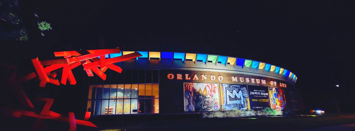 The exterior of the Orlando Museum of Art with banners promoting its Basquiat exhibition Photo by Athena Iluz/Flickr