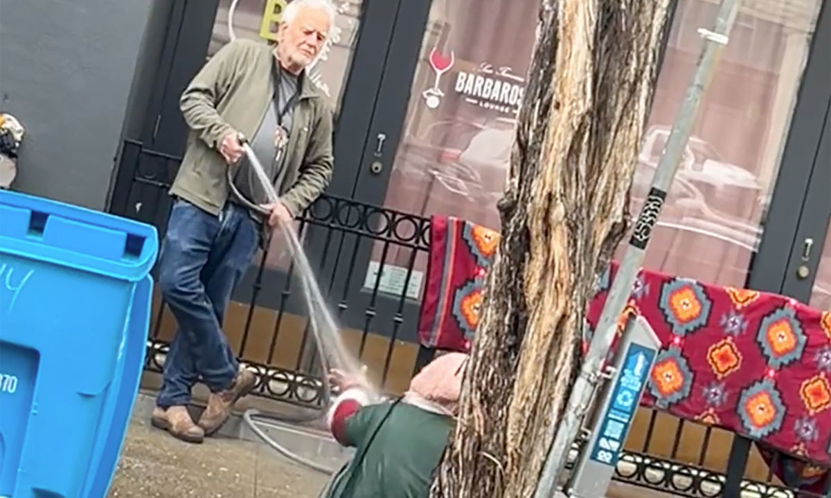 San Francisco gallerist filmed spraying unhoused lady with hose arrested and charged with battery San Francisco gallerist filmed spraying unhoused lady with hose arrested and charged with battery