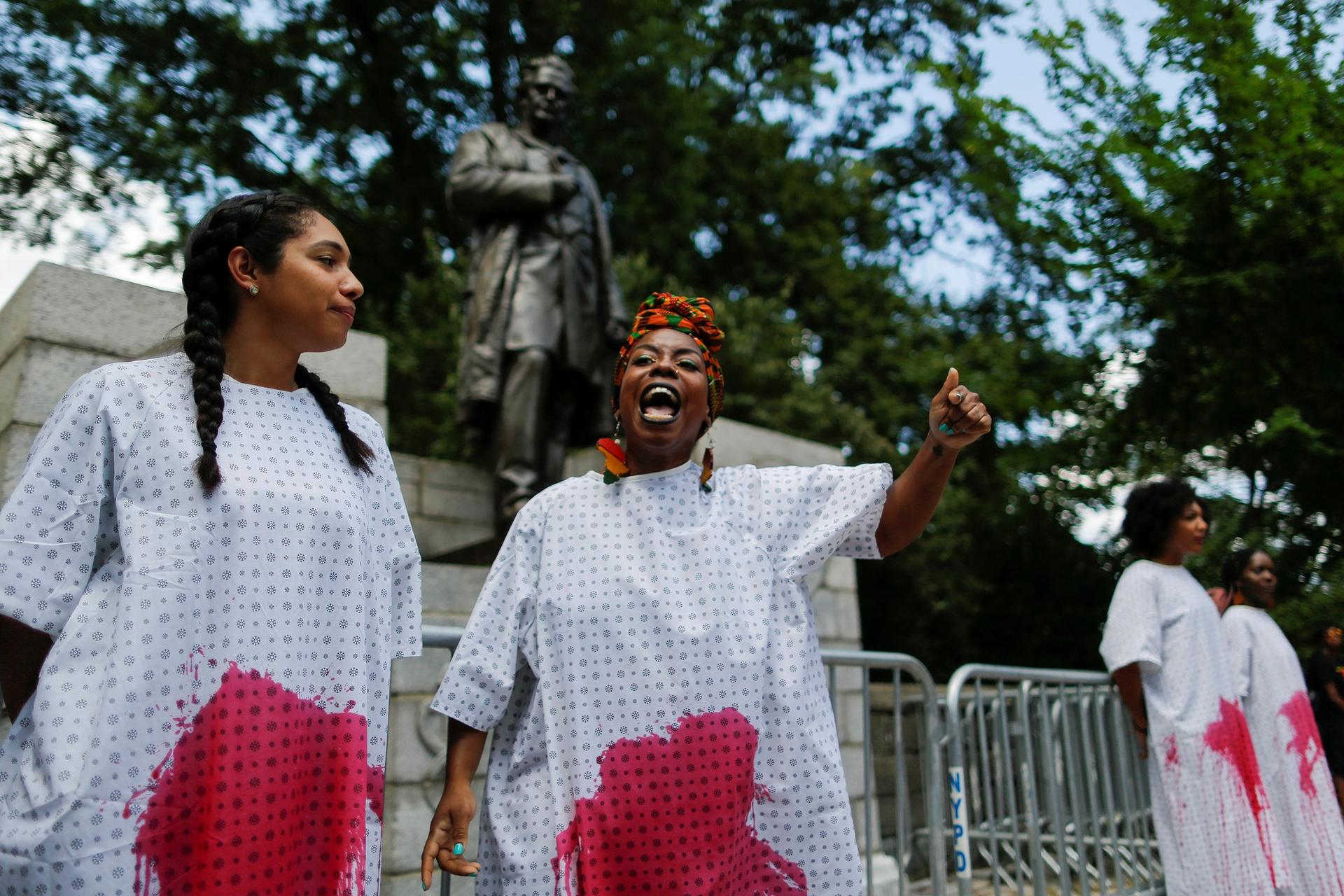 Women from Black Youth Project 100 protest against white supremacy in front of a statue of J. Marion Sims in New York REUTERS/Eduardo Munoz