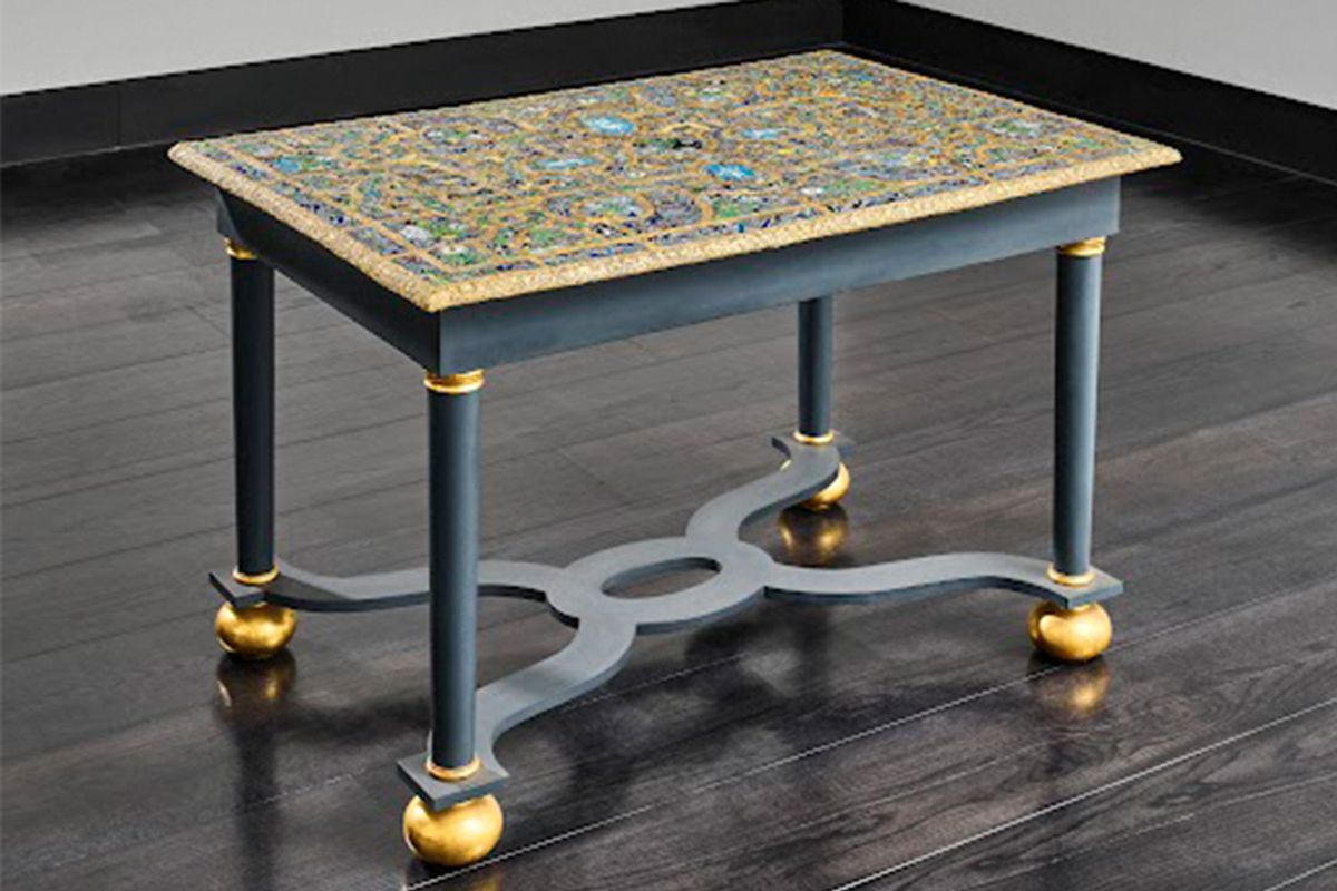 The table top is made of 111 panels of worked glass and pictorial panels 
Courtesy: Department of Culture, Media and Sport
