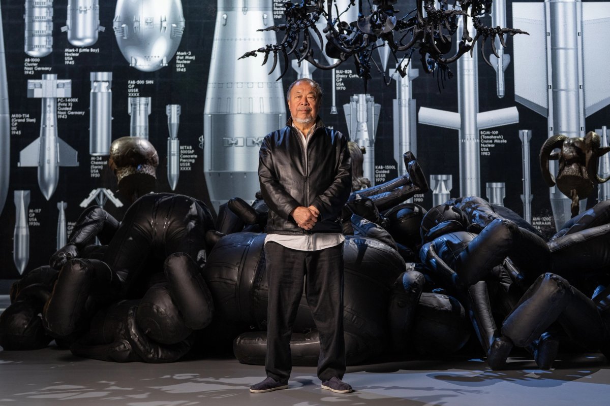 The artist in front of the new, large-scale commission History of Bombs
Photo: Hugo Glendinning