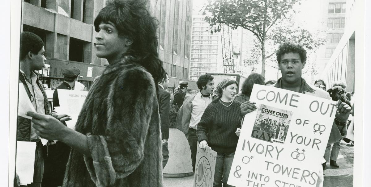 Untitled, around 1970. (Marsha P. Johnson hands out flyers in support of gay students at NYU) © Diana Davies / New York Public Library / Art Resource, NY