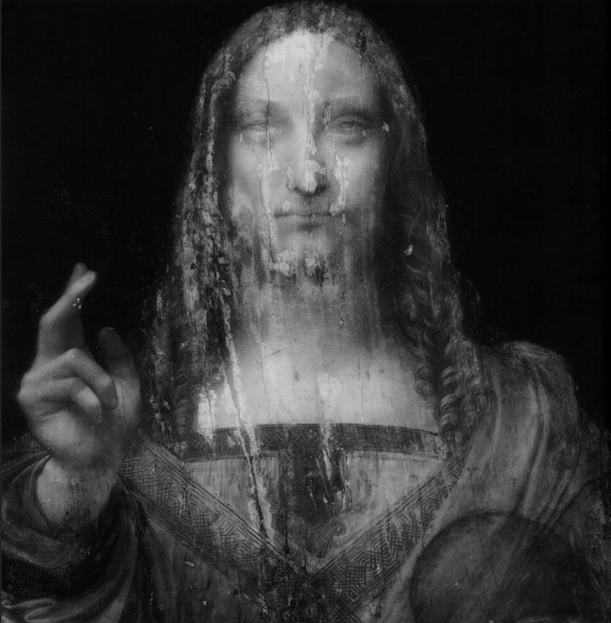 The back page of the book is the full-bleed of the infra-red reflectography of the Salvator Mundi 