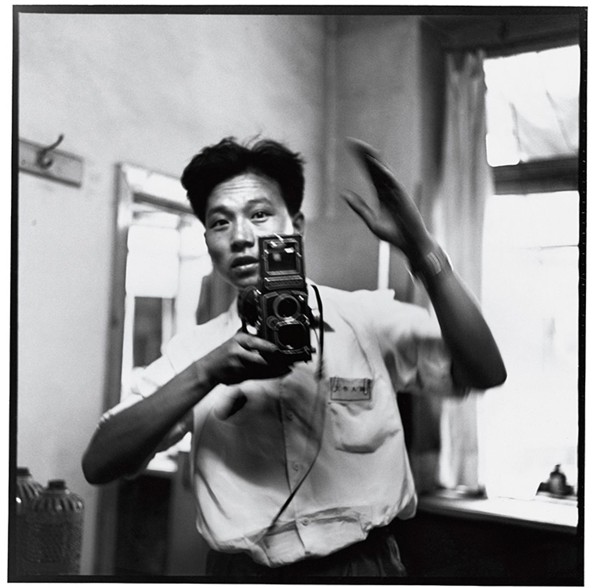 Self-portrait in the mirror, Harbin, July 1967 Credit: Li Zhensheng/Contact Press Images