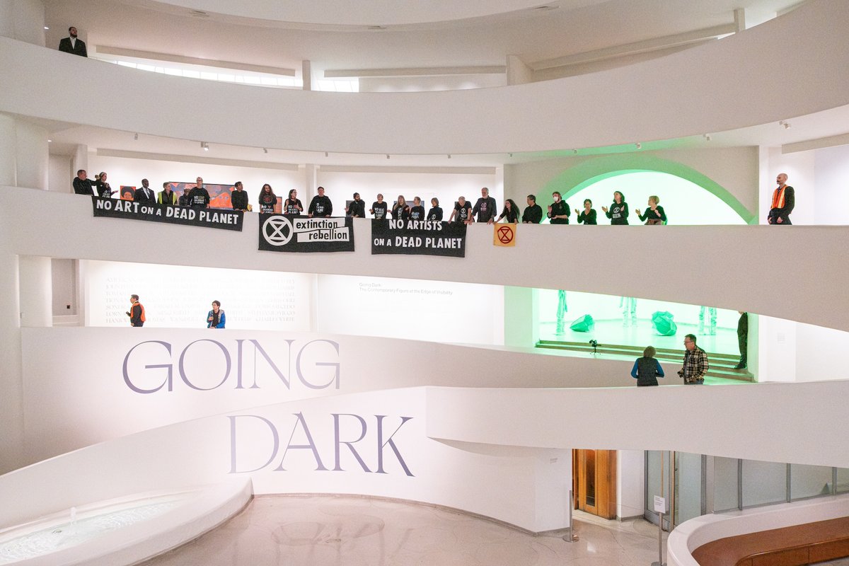 Members of Extinction Rebellion protest at the Solomon R. Guggenheim Museum in New York on 18 November Photo by @raybaileyphoto, courtesy Extinction Rebellion