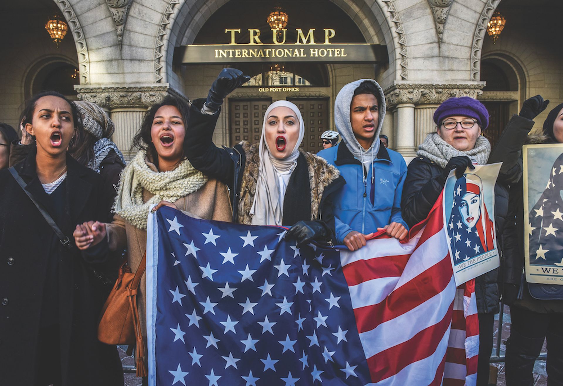 People outside a Trump hotel protest the travel ban in 2017, when it was first introduced on seven Muslim-majority countries Bill O’Leary/The Washington Post via Getty Images