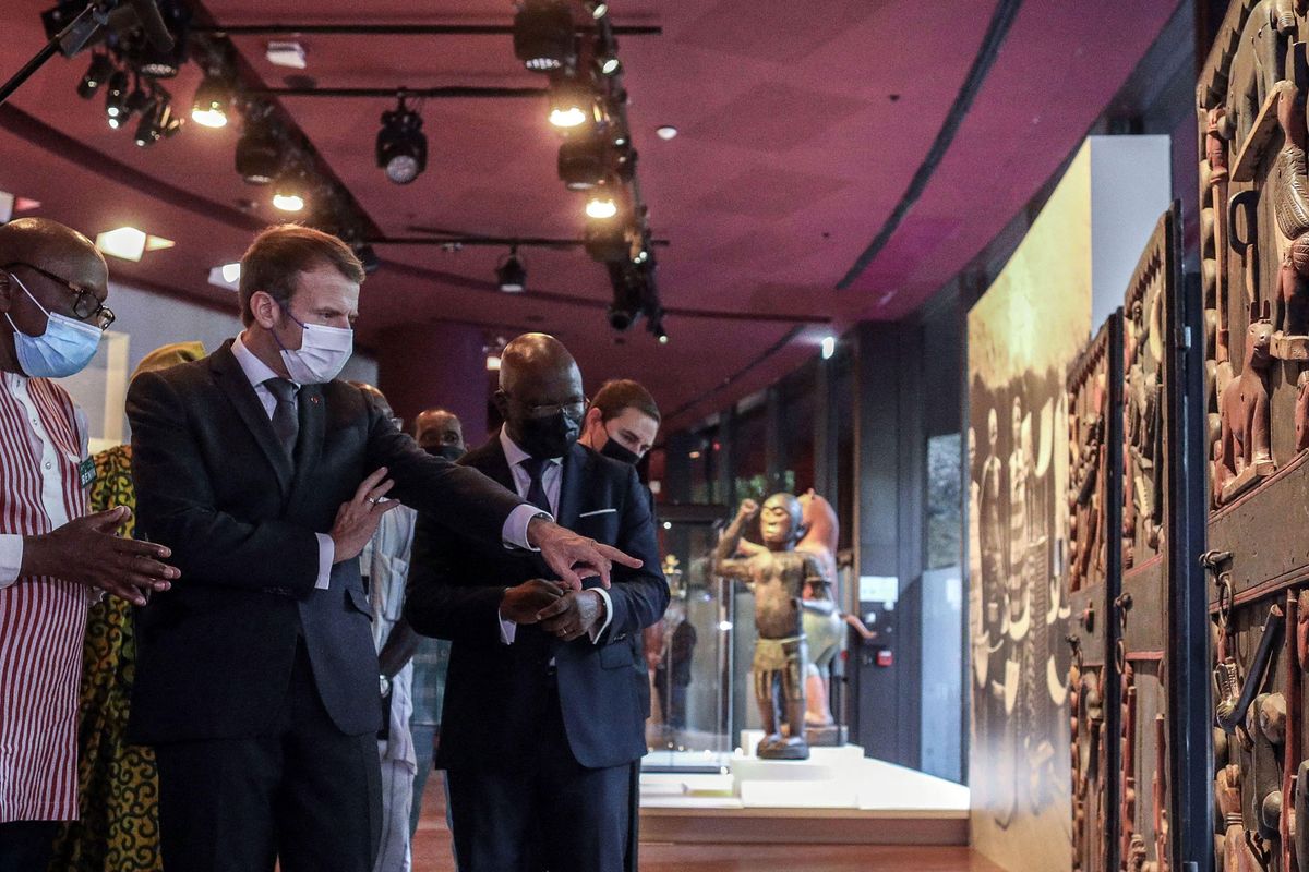 The French president Emmanuel Macron during the ceremony organised at the Quai Branly Museum-Jacques Chirac museum last October for the return of 26 works from the royal treasures of Abomey to the Republic of Benin Photo: Abaca Press / Alamy