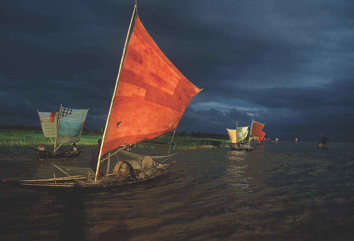 A large wall mural of one of Alam’s photographs of fishermen on the Brahmaputra river, painted with his fellow inmates, helped sustain him while he was in prison © Shahidul Alam/Drik/Majority World