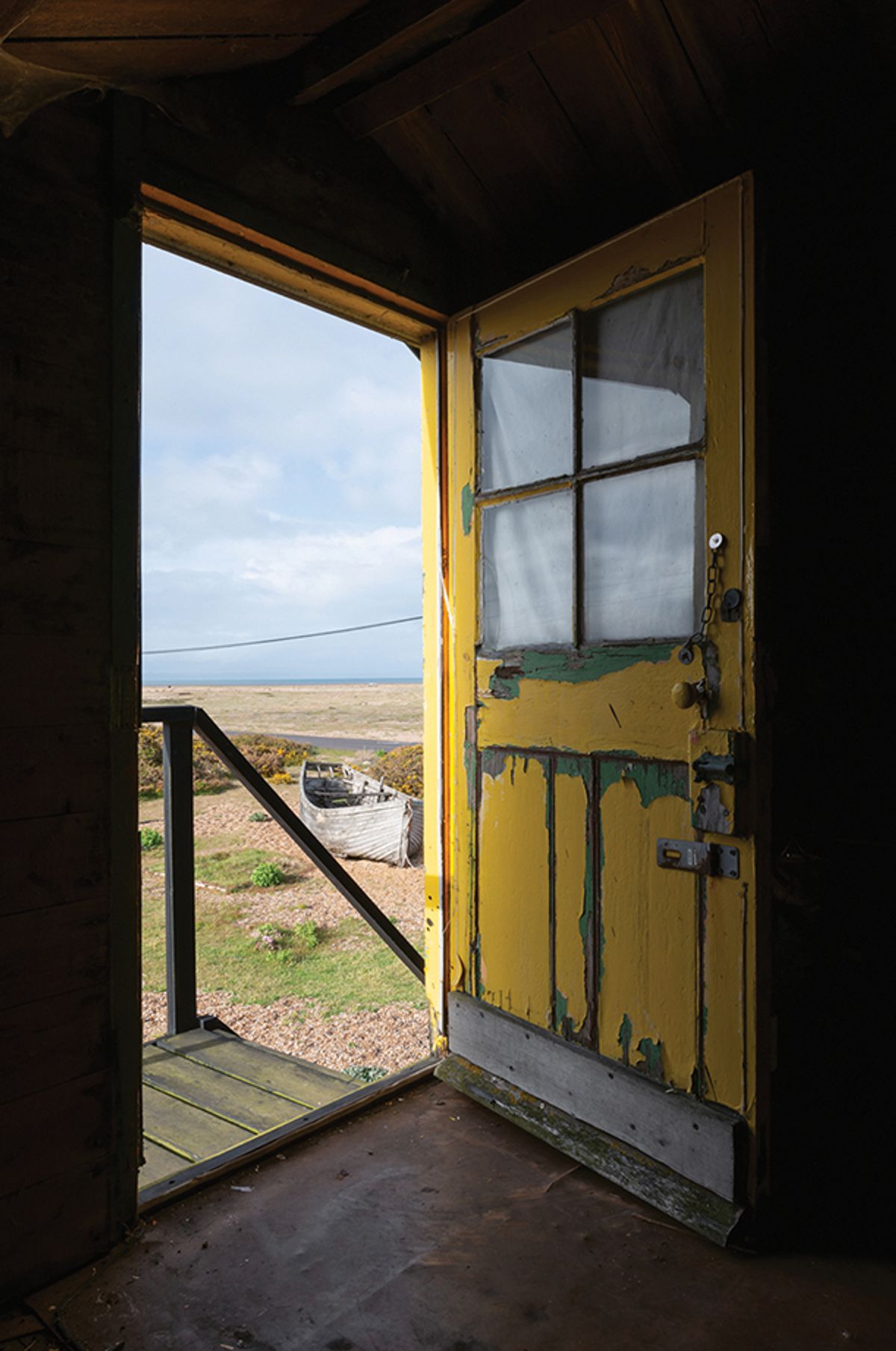 Derek Jarman’s storied home, Prospect Cottage, in Dungeness, Kent, with the loft entrance
© Gilbert McCarragher