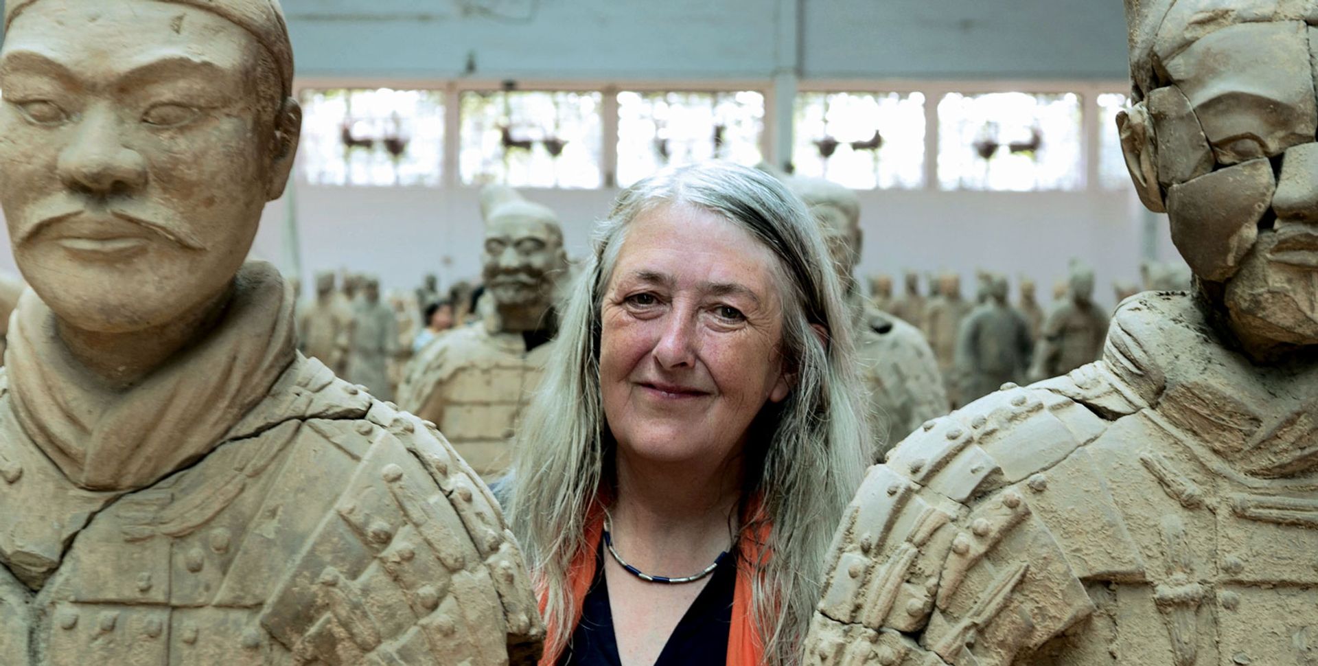 Mary Beard with terracotta army sculptures in Civilisations Nutopia