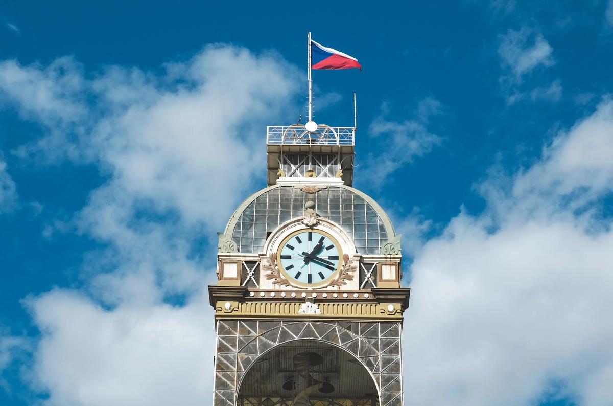 The tower of the Prague Exhibition Center with the Czech flag Photo: Jan Baborák on Unsplash