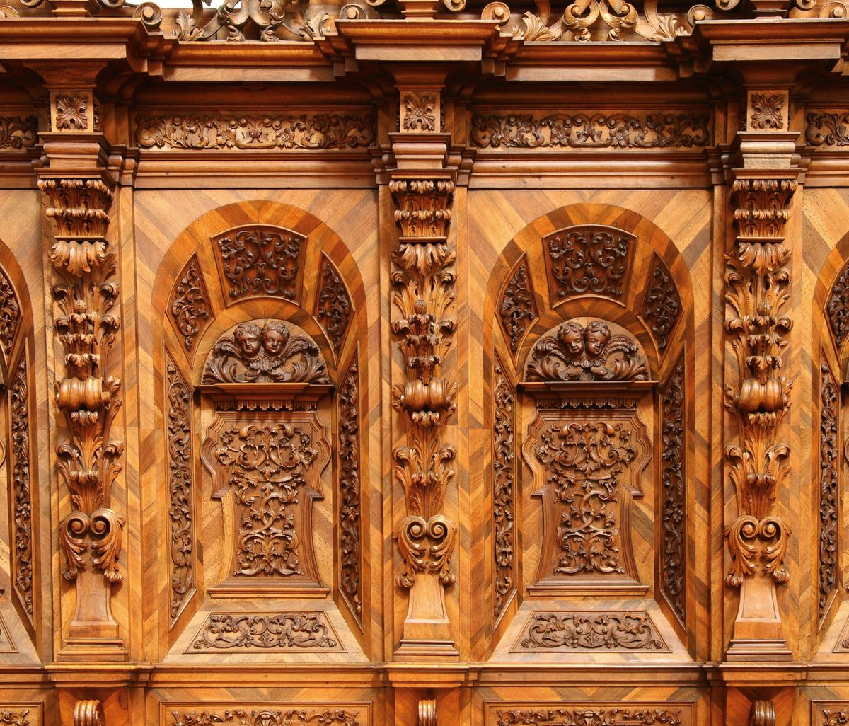 Detail of the carved and walnut-veneered choir stalls of the Premonstratensian church at Schlägl, Upper Austria, by Hans Georg Stempl (1732), a cabinet-maker in Rohrbach and, after his death, by his widow, to 1736