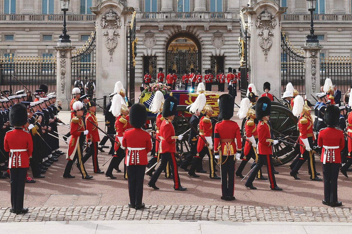Sombre and spectacular ceremonial: Queen Elizabeth II’s coffin passes Buckingham Palace, in London, following her state funeral at Westminster Abbey on 19 September
Photo: Hollie Adams/Bloomberg via Getty Images; © 2022 Bloomberg Finance LP