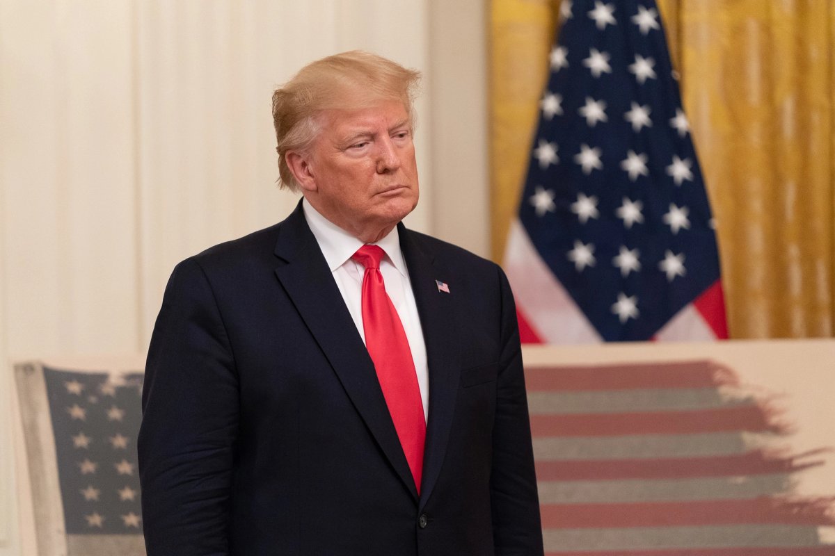 President Trump hosts the leader of the Smithsonian Institution in 2019, during a ceremony marking the return of a historic Second World War flag from the Netherlands. Official White House Photo by Shealah Craighead