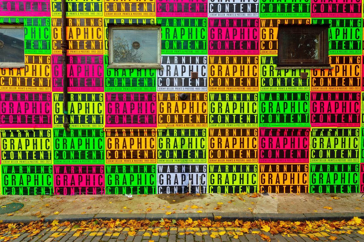 Jeremy Deller has wrapped the exterior of The Modern Institute in Glasgow with the title of his new exhibition. Courtesy of the Artist, The Modern Institute/Toby Webster Ltd, Glasgow and Galerie Art: Concept, Paris. Photo: Patrick Jameson