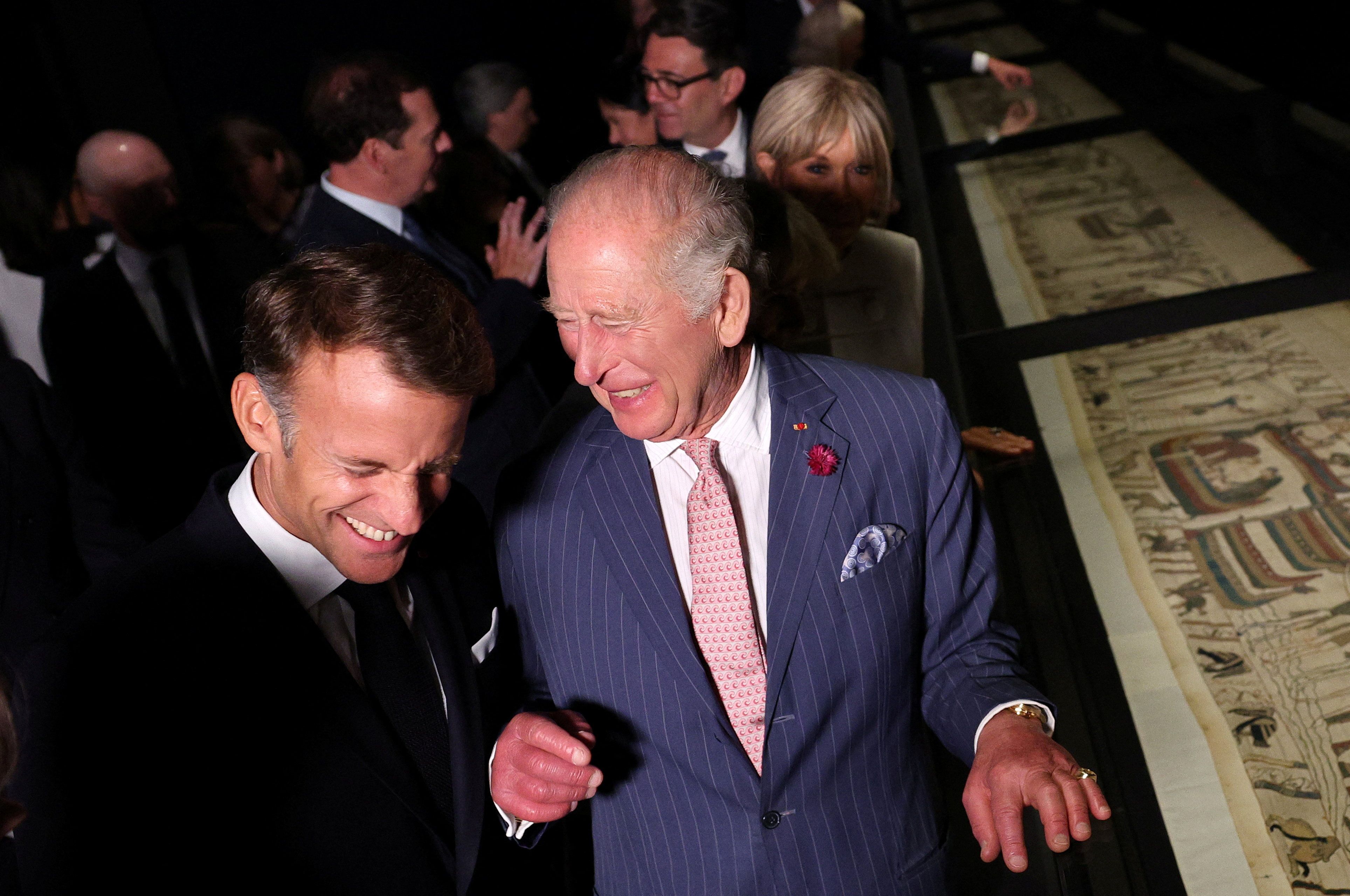 Britain's King Charles and France's President Emmanuel Macron at a preview event for the Bayeux Tapestry exhibition at the British Museum in London Photo: Adrian Dennis/Pool via REUTERS