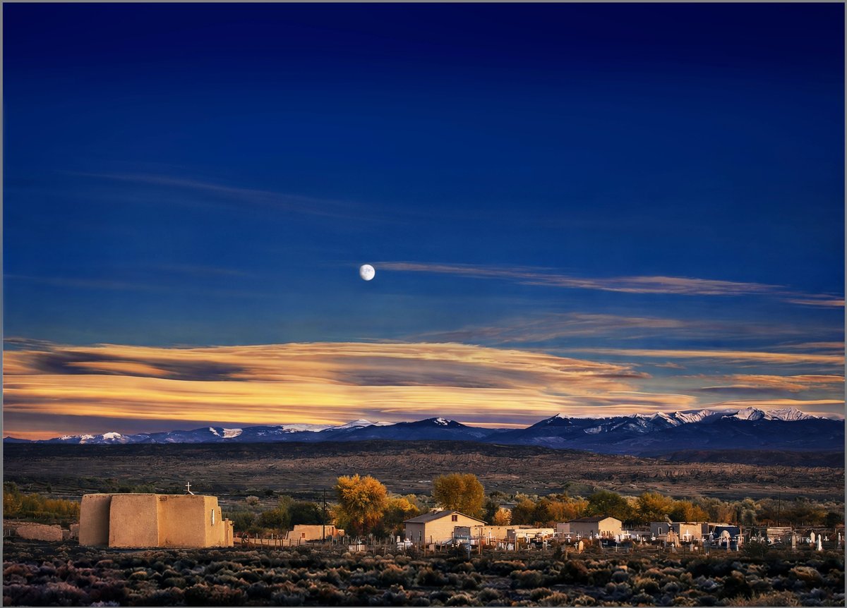 The offending “colourised” version of Ansel Adams’s Moonrise, Hernandez, New Mexico (1941), created by the gallerist James Danziger using AI