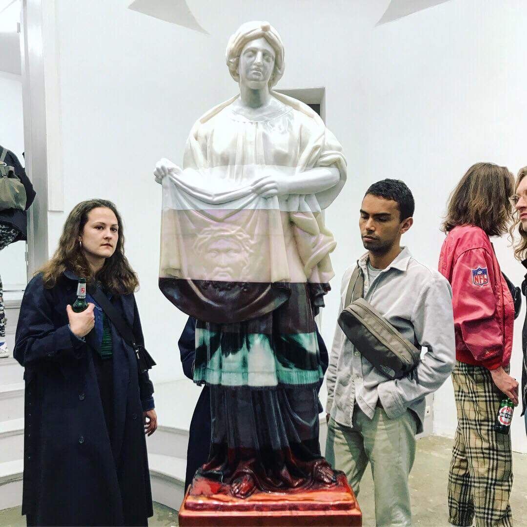 Visitors to Oliver Laric's exhibition at Tanya Leighton during Gallery Weekend Berlin Laurie Rojas