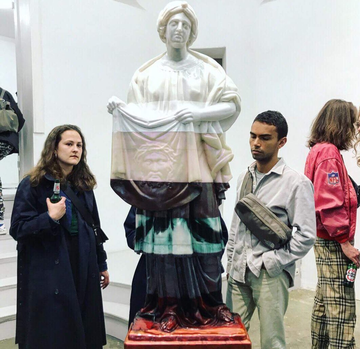 Visitors to Oliver Laric's exhibition at Tanya Leighton during Gallery Weekend Berlin Laurie Rojas