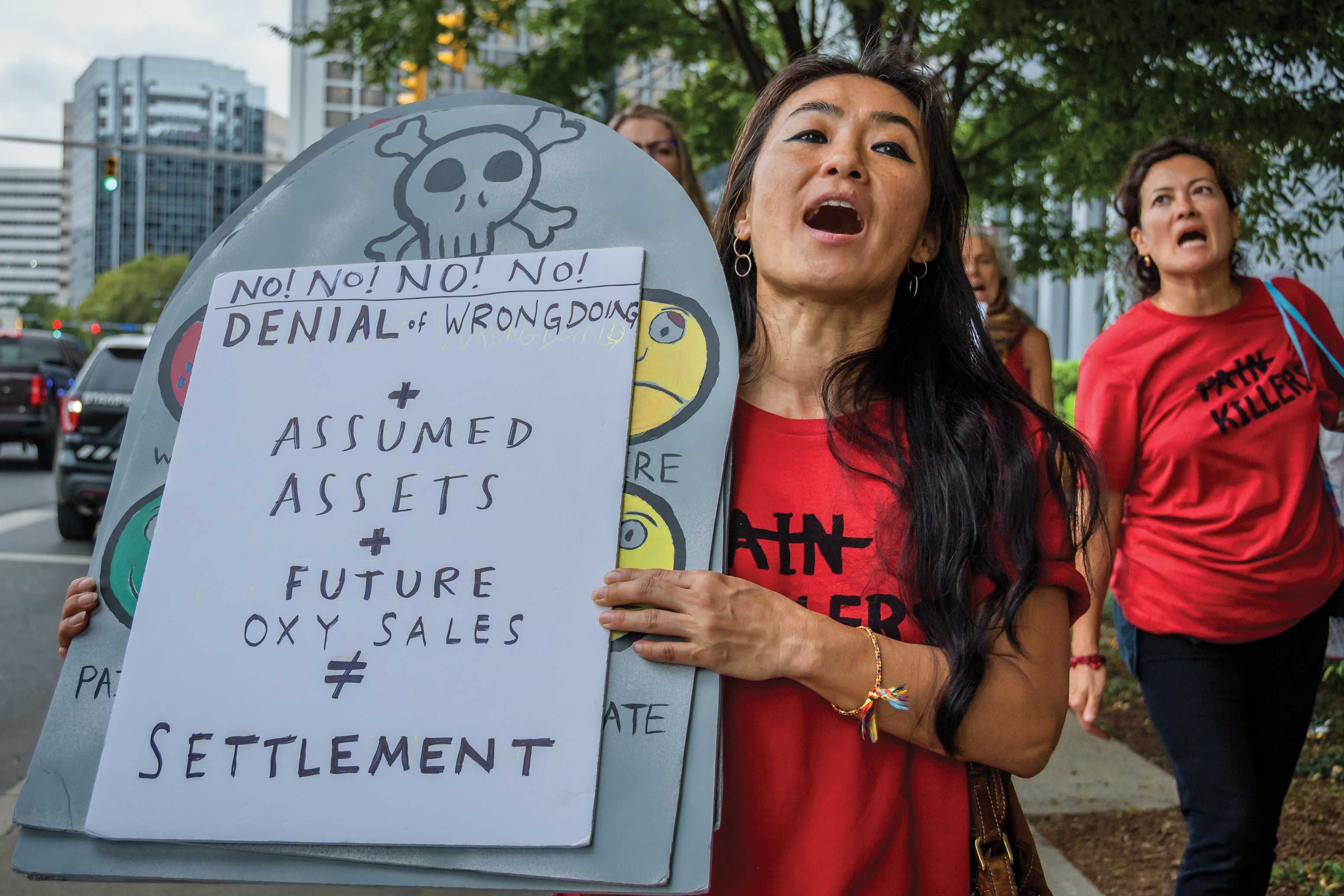 Protesters demonstrate outside of Purdue Pharma’s headquarters Photo: Erik McGregor/LightRocket via Getty Images
