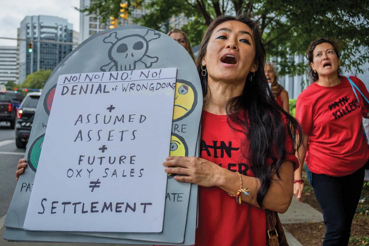 Protesters demonstrate outside of Purdue Pharma’s headquarters Photo: Erik McGregor/LightRocket via Getty Images