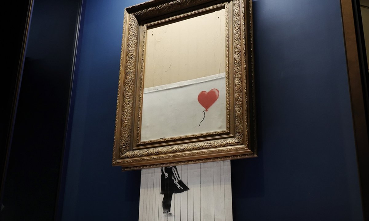 Banksy’s shredded Lady with Balloon retitled and redated for second time Banksy’s shredded Lady with Balloon retitled and redated for second time