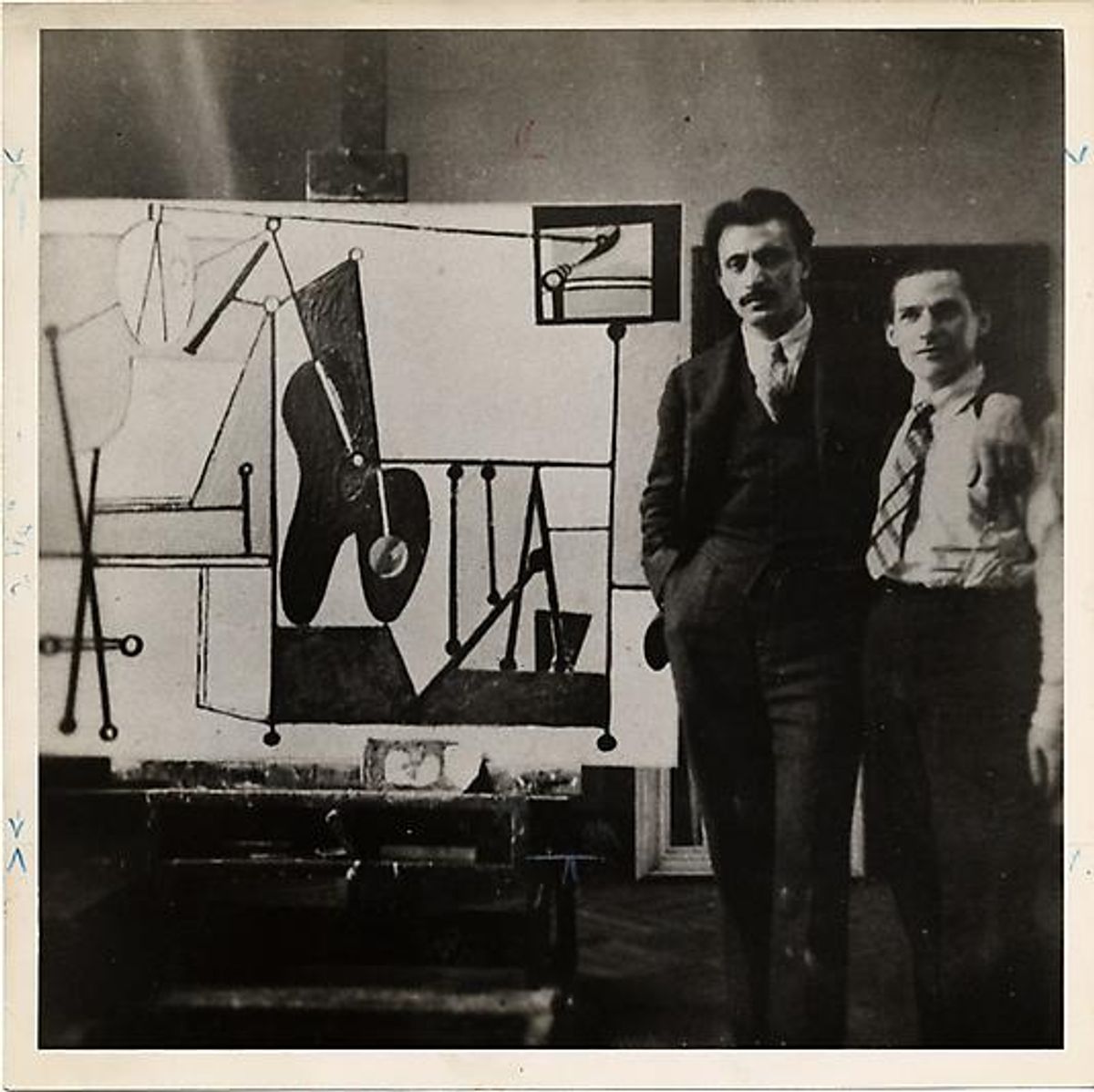 Abstract Expressionism, the standard bearer for this new golden era of American art, was a movement dominated by people and ideas from outside America. Like Arshile Gorky, who arrived in America having escaped the Armenian genocide, and Willem de Kooning, who moved from the Netherlands to the US as a 22-year-old stowaway, pictured here in Gorky's New York studio in 1937 Oliver Baker, Rudi Blesh papers, Archives of American Art, Smithsonian Institution