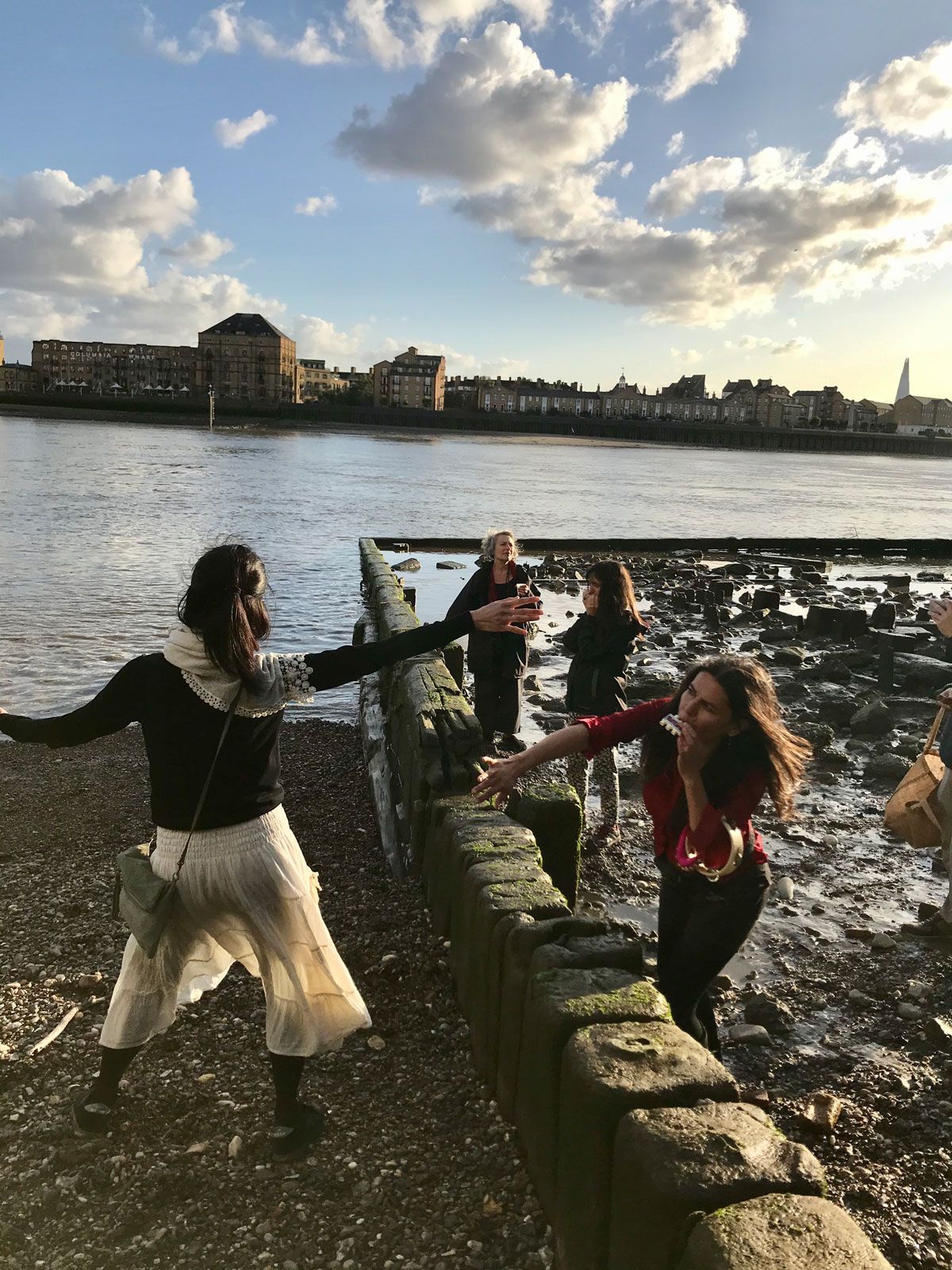 Luna Montenegro and friends  performing music and incantations by the River Thames Photo: Louisa Buck