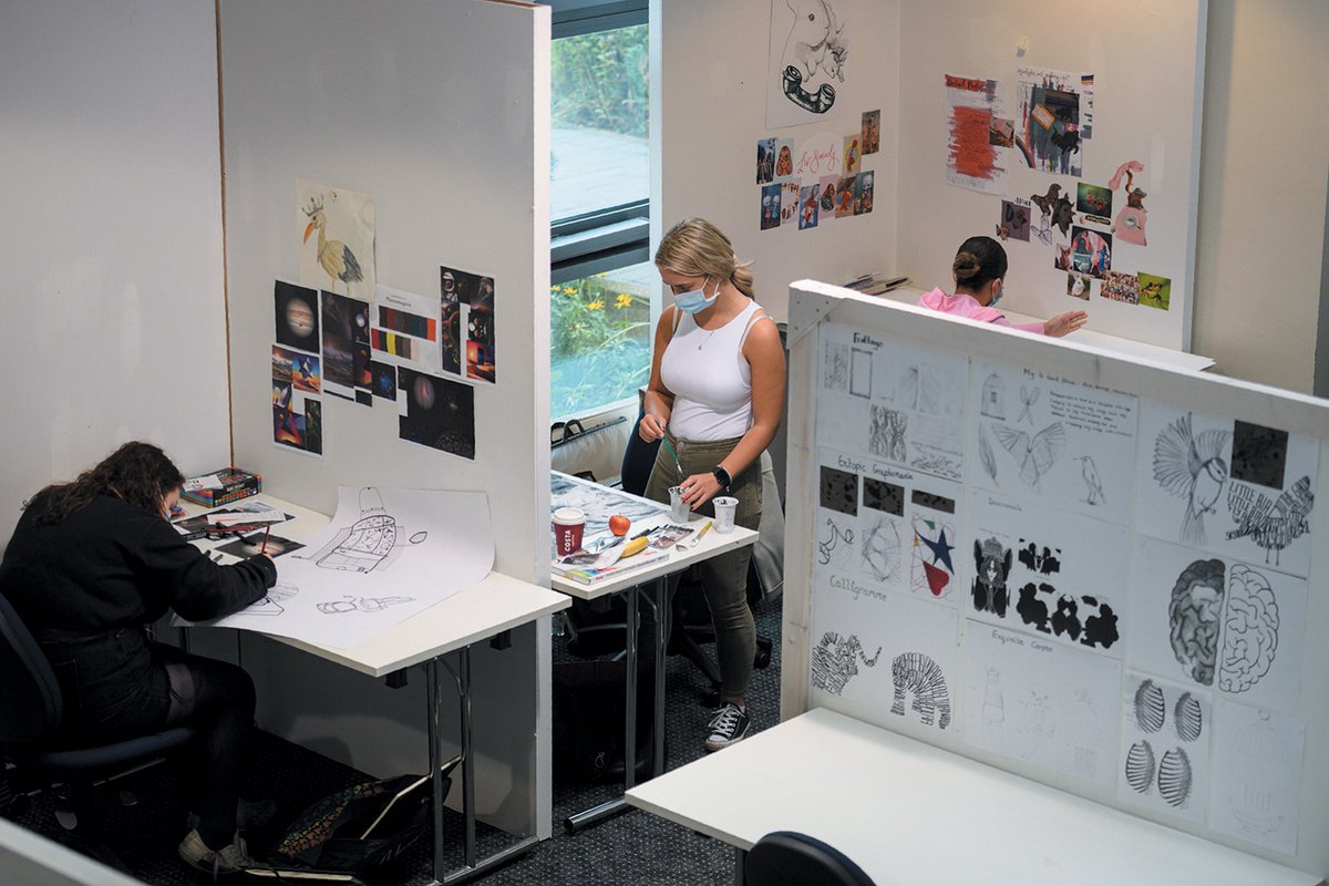 During the pandemic, students can work in studios only if they are separated by partitions and wearing face masks © OLI SCARFF/AFP via Getty Images