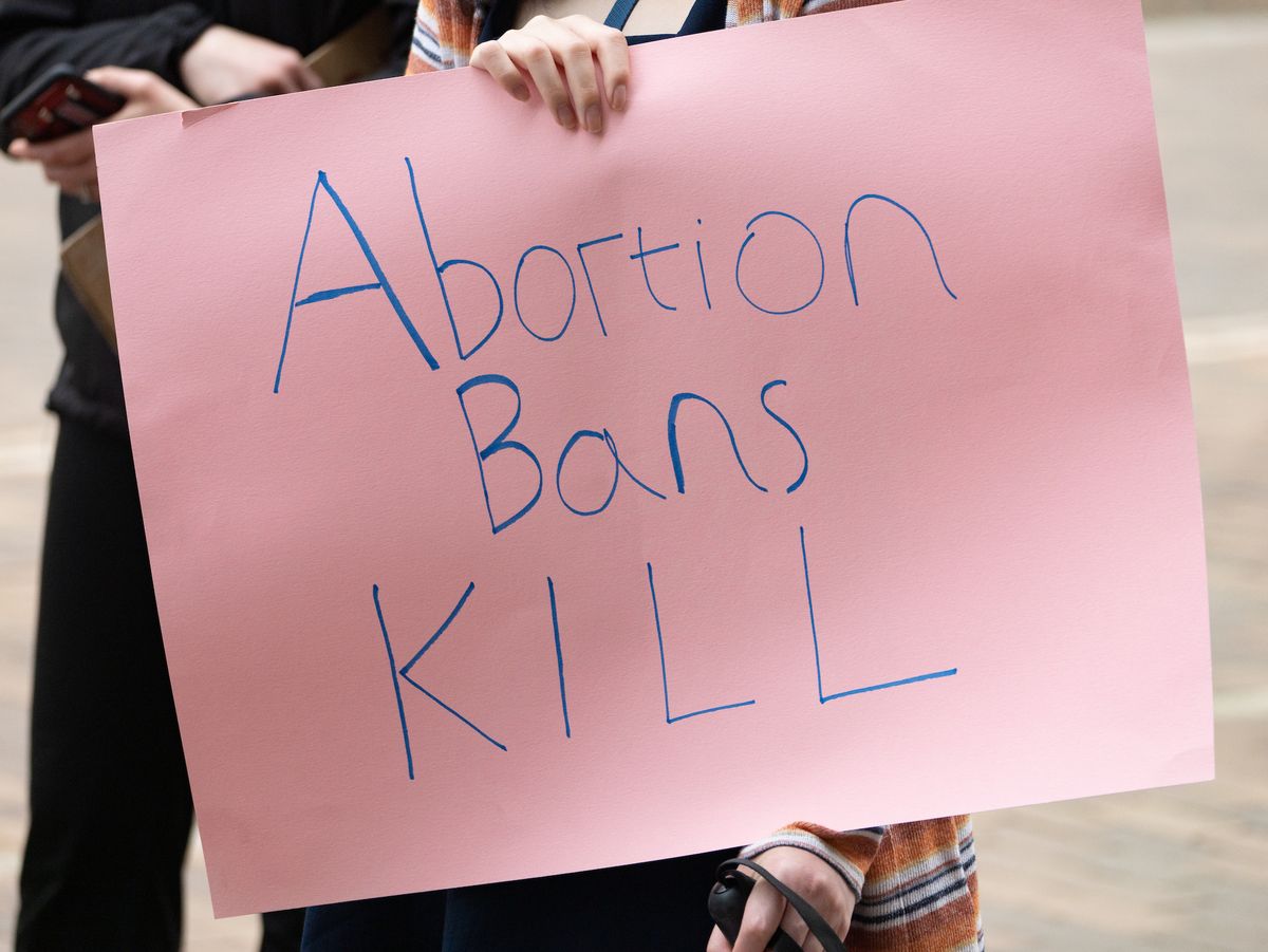 An abortion rights demonstrator holds a sign at a rally on 3 May 2022 in Pittsburgh, Pennsylvania. Photo by Mark Dixon, via Flickr.