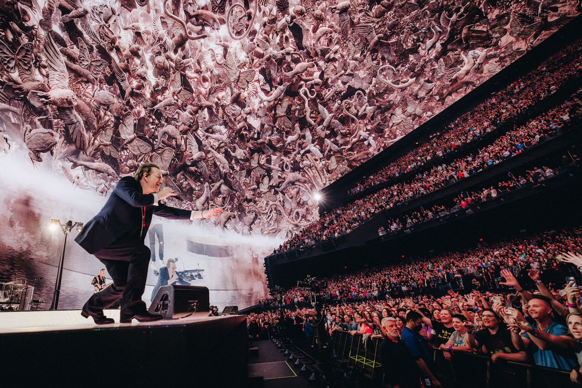 U2's Bono performs at Sphere in Las Vegas, with Es Devlin's video work Nevada Ark on the screens above Rich Fury