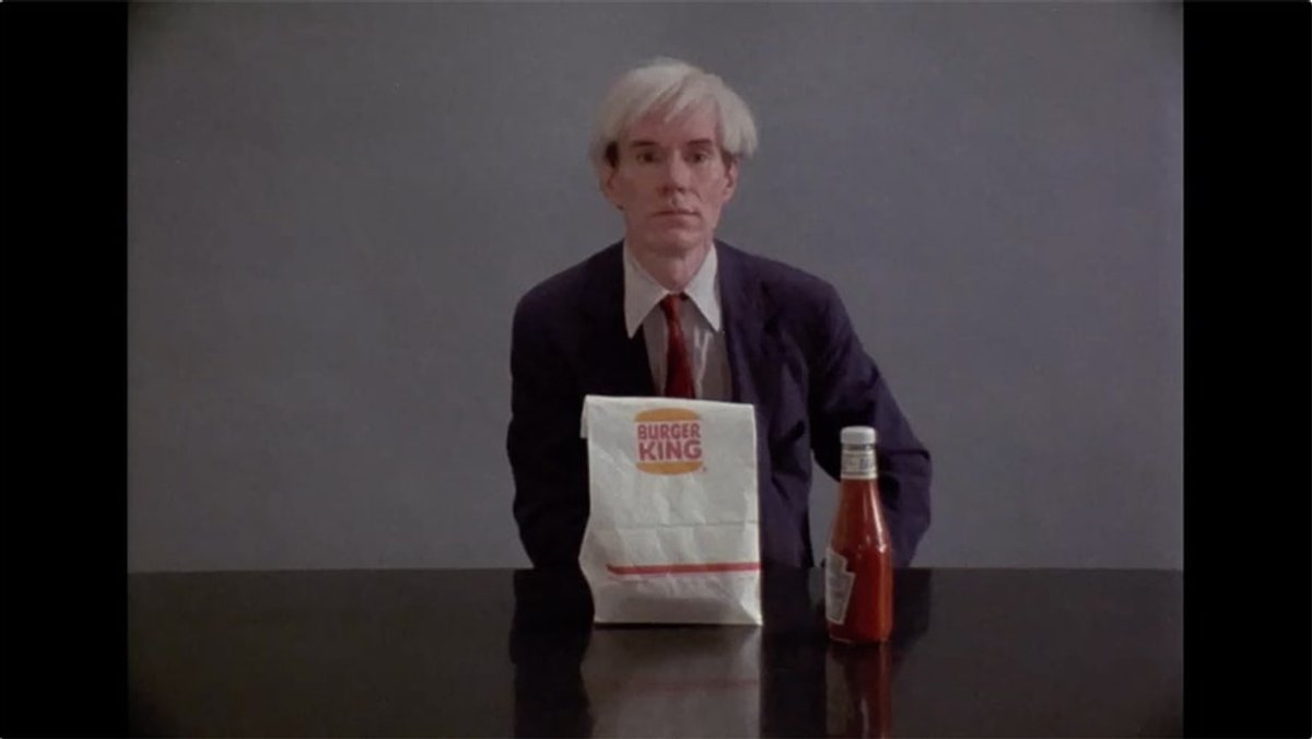 Andy Warhol eats a hamburger, from the Danish director Jorgen Leth’s 1982 film 66 Scenes from America