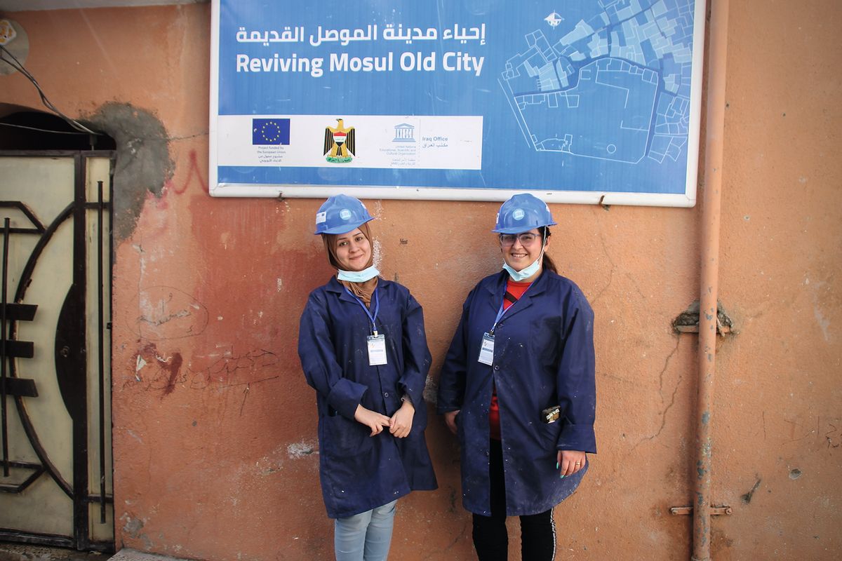 Noor Ammar (left) and Aveen Imad began conserving old city sites this year after training through Unesco’s Revive the Spirit of Mosul project. Hadani Ditmars.